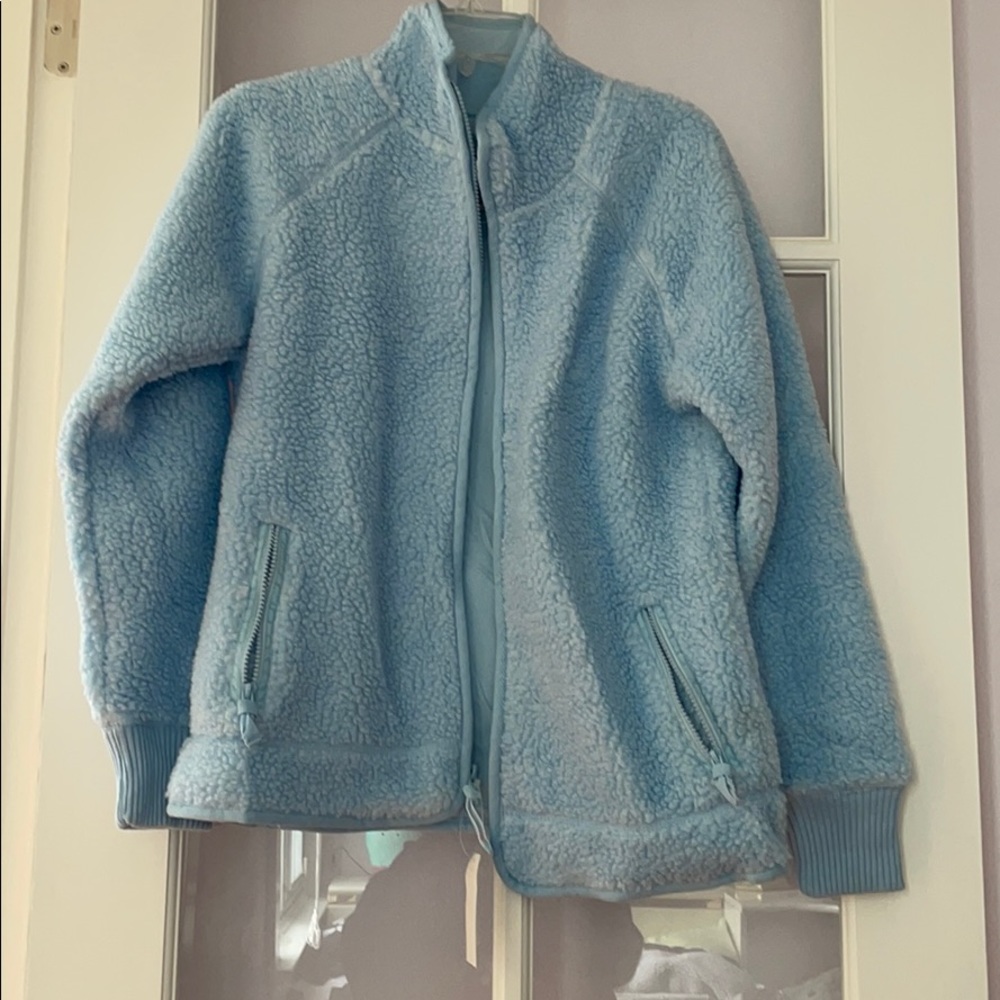 Brand new teddy jacket with dual zipper pockets